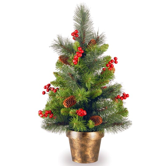 2ft. Crestwood Spruce Small Tree With Silver Bristle, Cones, Red Berries &#x26; Glitter In A Bronze Plastic Pot